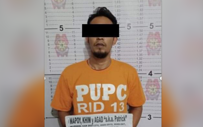 <p><strong>ARRESTED NPA LEADER.</strong> The Police Regional Office 13 (Caraga) reported the arrest of Kim Mapoy, 28, the former secretary of the Dismantled Guerrilla Front 4A (GF-4A), North Center Mindanao Regional Committee (NCMRC) of the New People’s Army in an operation in Alubijid, Buenavista, Agusan del Norte on Dec. 6, 2022. Authorities also nabbed in a separate operation on the same day the suspect’s brother Loreto Mapoy, the former commanding officer of Platoon Joker, GF4A, NCMRC. <em>(Photo courtesy of PRO-13 Information Office)</em></p>