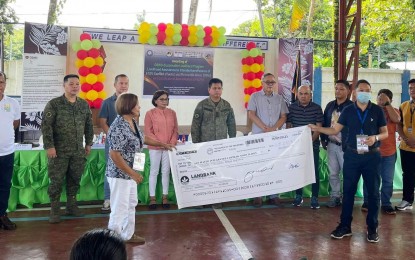 <p><strong>LIVELIHOOD AID</strong>. Associations in conflict-stricken communities in Eastern Samar receive livelihood grants from the government on Dec. 7, 2022. The Department of Social Welfare and Development regional office here turned over some PHP2.1 million in Sustainable Livelihood Program funds to associations from seven villages in Borongan City and Maydolong in Eastern Samar province. <em>(Photo courtesy of Imelda Bonifacio)</em></p>