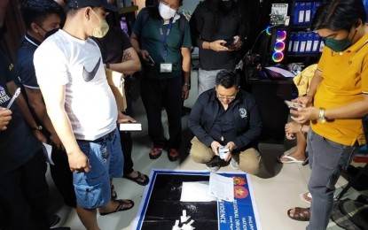 <p><strong>BUY-BUST.</strong> Police arrest agents of the Philippine Drug Enforcement Agency in a recent drug buy-bust in Taguig City. On Friday (Dec. 9, 2022), the Taguig government temporarily withdrew its support from the PDEA due to the incident. <em>(Contributed photo)</em></p>