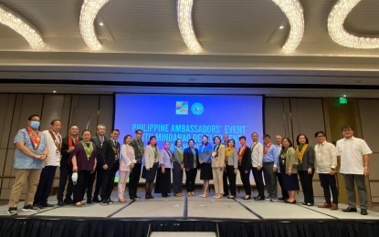 <p><strong>PH AMBASSADORS.</strong> Mindanao Development Authority officials led by Secretary Mabel Acosta (13th from left) pose with the 17 newly designated and confirmed Philippine Ambassadors Extraordinary and Plenipotentiary of the Department of Foreign Affairs (DFA) on Friday (Dec. 9, 2022) in Davao City. The Ambassadors visited the city as part of their Onsite Economic Diplomacy Program before they assume early next year their respective posts and assignments in various parts of Asia, the Middle East, Latin America, and Europe. <em>(Photo courtesy of MinDA) </em></p>