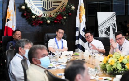 <p><strong>CUSTOMS BRIEFING. </strong>Senators JV Ejercito and Sherwin Gatchalian listen to a briefing by Customs Commissioner Yogi Filemon Ruiz (1st to 3rd from left) at the Bureau of Customs main office in Manila on Monday (Dec. 12, 2022). On top of the agenda was the Customs modernization program. <em>(Courtesy of BOC)</em></p>