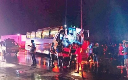 <p><strong>ROAD CRASH</strong>. Two persons died and 11 others were hurt when the passenger bus they were riding crashed into a concrete electric post in Orani, Bataan early Tuesday (Dec. 18, 2022). The 11 injured passengers, including the bus driver, were immediately given medical treatment. <em>(Photo courtesy of the Bataan Police Provincial Office)</em></p>