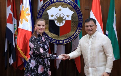 <p><strong>COURTESY CALL</strong>. Hungarian Ambassador to the Philippines, Titanilla Tóth (left) and DND OIC Undersecretary Jose Faustino Jr. during the courtesy call of the former on Dec. 12, 2022. <em>(Photo courtesy of DND) </em></p>