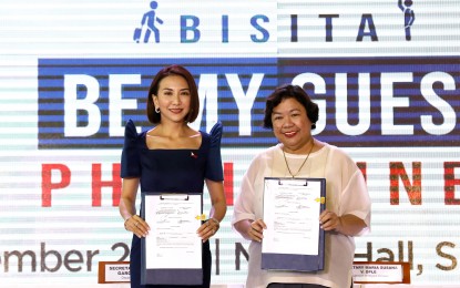 <p><strong>CAMPAIGN LAUNCH.</strong> Tourism Secretary Ma. Christina Frasco and Migrant Workers Secretary Susan Ople during the BBMG campaign launch at SM Mall of Asia music hall in Pasay City on Thursday (Dec. 15, 2022). The event was attended by over 250 industry leaders and representatives from the public and private sector and media. <em>(PNA photo by Joey Razon)</em></p>