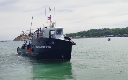 <p><strong>READY TO SAIL</strong>. The 62-footer steel-hulled ring net fishing vessel sets sail from the coastal waters of Sual town, Pangasinan to Damortis in La Union on Dec. 15, 2022. The Bureau of Fisheries and Aquatic Resources turned over the vessel to the Damortis Fisherfolks Cooperative. <em>(Photo by Hilda Austria)</em></p>