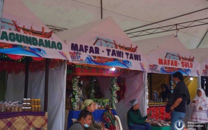 <p><strong>PROMOTING AGRI-PRODUCTS.</strong> Exhibitors at the agri-trade fair from various parts of the Bangsamoro Autonomous Region in Muslim Mindanao (BARMM) display their native products as part of the Shariff Kabunsuan Festival that opened in Cotabato City on Thursday (Dec. 15, 2022). The festival will be highlighted on Dec. 19 with the commemoration of Shariff Kabunsuan’s introduction of Islam in Mindanao through the Rio Grande River in the 16th century. <em>(Photo courtesy of from Bangsamoro Information Office -BARMM)</em></p>
