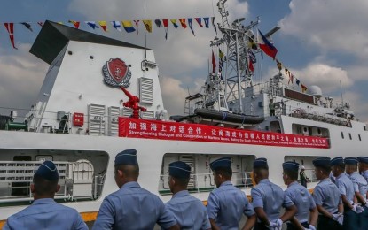 <p><strong>GUEST.</strong> A vessel of the China Coast Guard docks at Pier 15 in Port Area, Manila on Jan. 14, 2020. At the time, Chinese officials said the visit aimed to strengthen dialogue and cooperation on maritime law enforcement. <em>(Xinhua/Rouelle Umali)</em></p>