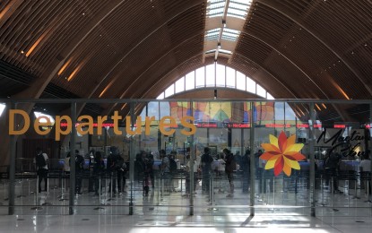 <p><strong>HOLIDAY TRAVEL</strong>. Undated photo shows passengers lining up at the international departure hall of Mactan-Cebu International Airport. Research conducted by a US-based travel sales agency showed that more travelers, including 'balikbayans', are coming home to Cebu from the US during this year's Yuletide season.<em> (PNA photo by Carlo Lorenciana)</em></p>
<div><em> </em></div>