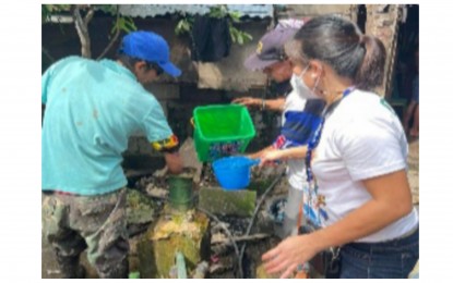 <p><strong>DISINFECTION.</strong> Personnel of Bacolod City Health Office disinfect a deep well in one of the villages last week. Monitoring of water and food sources continues as more cases of acute gastroenteritis and cholera have been reported in the city this month. <em>(Photo courtesy of Bacolod City Health Office)</em></p>
<p> </p>
<p> </p>