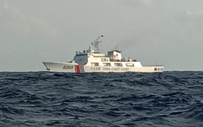 <p><strong>CCG PRESENCE.</strong> A China Coast Guard (CCG) ship shadows the Philippine resupply boat in Ayungin Shoal in Philippine territorial waters in the West Philippine Sea on Dec. 17, 2022. In a statement on Sunday, the Western Command said the Chinese radio challenges would claim that the sea area near the Philippine ship is “under the jurisdiction of the People’s Republic of China.”<em> (Photo courtesy of Joint Task Force West/Western Command)</em></p>