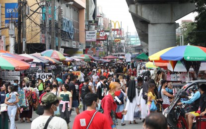 <div class="caption">
<p><strong>LAST-MINUTE SHOPPING.</strong> Shoppers flock to Baclaran, Parañaque City for gifts and other food items on Thursday (Dec. 22, 2022). Nearly three years into the Covid-19 pandemic, economic activities are back to normal. <em>(PNA photo by Avito Dalan)</em></p>
</div>