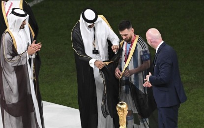 <p>Lionel Messi (10) of Argentina is seen on stage during a ceremony after the FIFA World Cup 2022 Final Match between Argentina and France at Lusail Stadium in Lusail City, Qatar on Dec. 18, 2022. Argentina beat France after penalty shoot-out to win FIFA World Cup. <em>(Ercin Erturk-Anadolu Agency)</em></p>