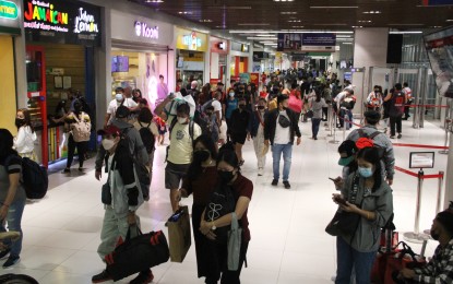 <p>Passengers inside the Parañaque Integrated Terminal Exchange <em>(PNA photo by Jess Escaros Jr.)</em></p>