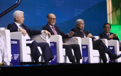 <p><strong>PRESIDENT’S MEN. </strong>(From left) Trade and Industry Secretary Alfredo Pascual, Finance Secretary Benjamin Diokno, Bangko Sentral ng Pilipinas Governor Felipe Medalla and Economic Planning Director General Arsenio Balisacan answer questions during a media briefing in this undated photo. The Finance department’s yearend report showed that emerging collections from the Bureau of Internal Revenue and the Bureau of Customs reached PHP3.2 trillion, surpassing the 2022 target by 2.2 percent. <em>(Courtesy of DOF Facebook)</em></p>