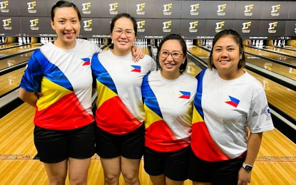 <p><strong>HONG KONG-BOUND.</strong> National bowlers (L-R) Marian Lara Posadas-Wong, Maria Lourdes Arles, Rachelle Leon and Krizziah Lyn Macatula are among the 12 athletes scheduled to join the 26th Asian Tenpin Bowling Championships on Jan. 8-18, 2023 at the South China Athletic Association Bowling Centre in Hong Kong. Photo taken at the IBF Worlds in Australia. <em>(Contributed photo)</em></p>