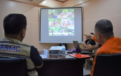 <p><strong>SITUATION BRIEFING.</strong> Misamis Occidental Gov. Henry Oaminal (right) briefs on Wednesday (Dec. 28, 2022) Department of National Defense officer-in-charge Undersecretary Jose Faustino Jr. on the situation of the province after nine of the 14 municipalities were hit by flood and landslides on Dec. 24, 2022. Faustino lauded the provincial government’s quick response to the affected communities. <em>(Photo courtesy of MisOcc Information Office)</em></p>