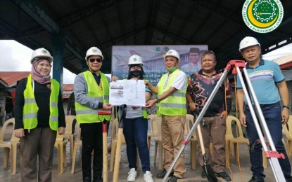 <p><strong>MODERN MARKET.</strong> Bangsamoro Autonomous Region in Muslim Mindanao Interior Minister Naguib Sinarimbo (2nd from left) and Mayor Ma. Rona Piang-Flores (3rd from left) lead other officials in the groundbreaking for the construction of a PHP25-million modern public market in North Upi, Maguindanao del Norte on Tuesday (Dec. 27, 2022). The project is seen to increase revenue generation for the town. <em>(Photo courtesy of MILG – BARMM)</em></p>