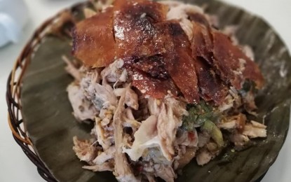 <p><strong>LECHON QUALITY</strong>. Photo shows sliced roasted pig or lechon placed on a native platter at a restaurant in Carcar, Cebu. Department of Trade and Industry-Central Visayas Consumer Protection Desk chief Joy F. Suralta on Thursday (Dec. 29, 2022) advised lechon business owners in the province to make true to their obligation to deliver the agreed size and quality to avoid complaints that spoil holiday celebrations. <em>(Contributed photo)</em></p>