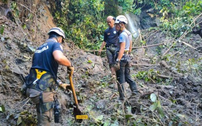 <p><strong>SEARCH AND RESCUE OPERATIONS.</strong> Rescue workers conduct retrieval operations on Thursday (Dec. 29, 2022) for the three missing persons following a landslide in Barangay Don Salvador Lopez, Mati City in Davao Oriental on Wednesday (Dec. 28, 2022). The Mati City Disaster Risk Reduction Management Office those missing are Roberto Pelaez Ampo, 52, and two boys aged 15 and 14, respectively. <em>(Photo courtesy of Mati CIO)</em></p>