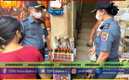 <p><strong>CHECK</strong>. Policemen check retailers of firecrackers and pyrotechnics in Tacloban City in this photo released on Thursday (Dec. 29, 2022). Days before the New Year celebrations, the Philippine National Police is stepping up its watch on firecrackers trade in the region to ensure safe revelries. <em>(Photo courtesy of Tacloban police)</em></p>