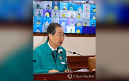 <p><strong><span data-preserver-spaces="true">RESTRICTED</span></strong><span data-preserver-spaces="true"> Prime Minister Han Duck-soo presides over a meeting tackling measures against coronavirus disease on Friday (Dec. 30, 2022). Han said South Korea would require travelers coming from China to show negative COVID-19 tests amid the spiking number of infections in the eastern Asian country. <em>(Yonhap)</em></span></p>
