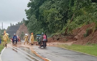 <p><strong>LANDSLIDE</strong>. A minor landslide closed half a lane of the road on Wednesday (Jan. 4, 2023) in Tadoc village in Abuyog, Leyte. Non-stop rains in Eastern Visayas over the past few days have triggered landslides and floods, authorities reported on Thursday (Jan. 5). <em>(Photo courtesy of Department of Public Works and Highways)</em></p>
