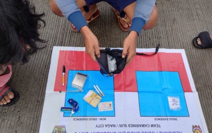 <p><strong>DRUGS.</strong>  Two suspects were arrested and at least PHP1.5 million worth of illegal drugs were seized in anti-drug operations in Bicol Regio on Thursday (Jan. 5, 2023) at Zone 5, Sitio Langon, Barangay Cararayan, Naga City. A total of 220 grams of illegal drugs were taken from the drug suspects. <em>(Photo courtesy of PRO-5)</em></p>