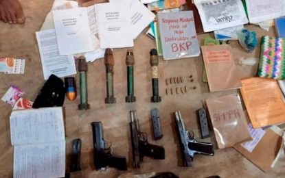 <p><strong>WEAPONS STASH.</strong> Three high-ranking members of a dismantled New People's Army guerilla front yielded firearms and ammunition after their arrest in Calatrava town, Negros Occidental province on Friday night (Jan. 6, 2023). Two of the three suspects have standing warrants of arrest and are facing criminal charges for illegal possession of firearms and ammunition, homicide and murder. <em>(Courtesy of PA-79IB)</em></p>