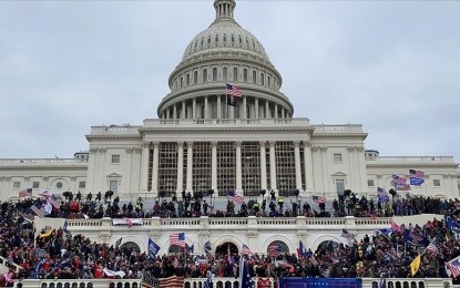 Biden marks 2nd anniv of Capitol riots, awards officials | Philippine ...