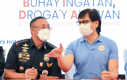 <p><strong>NO TO DRUGS.</strong> Philippine National Police chief Gen. Rodolfo Azurin Jr. (left) and Local Government Secretary Benhur Abalos lead the soft launch of the anti-illegal drugs program "Buhay Ingatan, Droga’y Ayawan" at Rizal Park Hotel in Ermita, Manila on Oct. 7, 2022. Azurin has supported Abalos’ call for high-ranking police officials to submit their courtesy resignations to cleanse the institution of links to illegal drugs. <em>(Courtesy of Office of the Chief PNP Facebook)</em></p>