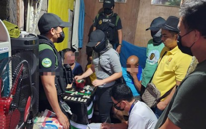 <p><strong>DISMANTLED</strong>. Agents of the Philippine Drug Enforcement Agency (PDEA) in Central Visayas conduct an on-site inventory of evidence in the presence of witnesses after a drug den dismantling operation in Barangay Duljo-Fatima, Cebu City on Sunday (Jan. 8, 2023). PDEA-7 public affairs chief Leia Alviar Alcantara said the first two dismantling operations of the new year yielded eight suspects, including two maintainers.<em> (Photo courtesy of PDEA-7)</em></p>