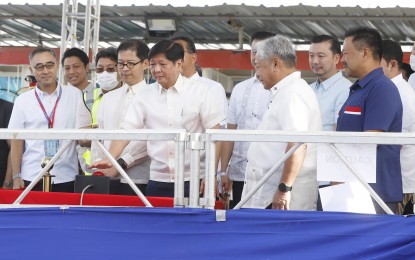 <p><strong>SUBWAY LAUNCH.</strong> President Ferdinand R. Marcos Jr. and Transportation Secretary Jaime Bautista (3rd and 4th from left) during the launch of the Metro Manila Subway Project’s tunnel boring machine in Barangay Ugong, Valenzuela City on Jan. 9, 2023. The subway project is among the 67 infrastructure flagship projects that have been approved and are ongoing construction as part of the Marcos administration's "Build Better More" program. <em>(PNA photo by Alfred Frias)</em></p>