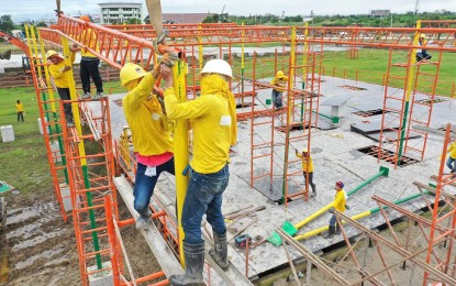 <p><strong>DOUBLE PAY.  </strong>Workers will get double pay when they render work on Friday (Apr. 21, 2023) which was declared regular holiday in observance of Eid'l Fitr. The Department of Labor and Employment (DOLE) reminded employers in the private sector to be guided on how to compensate their employees during holiday.<em> (PNA file photo)</em></p>