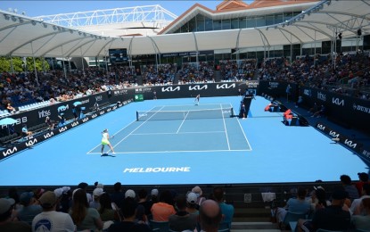 <p><strong>AUSTRALIAN OPEN</strong>. Jelena Ostapenko (front) of Latvia in action against Alison Riske (rear) of USA during their women's singles match within the 2022 Australian Open in Melbourne, Australia on Jan. 19, 2022. Ostapenko beat her opponent Riske with 2-0 and qualified for the third round.<em> (Recep Sakar - Anadolu Agency)</em></p>