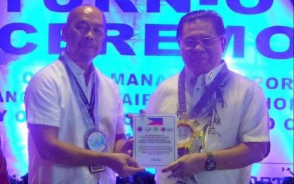 <p><strong>AIRPORTS’ TURNOVER.</strong> Bangsamoro Autonomous Region in Muslim Mindanao (BARMM) Chief Minister Ahod Ebrahim (right) poses with CAAP intelligence division chief Brig. Gen. Dionisio Robles during the turnover Tuesday (Jan. 10, 2023) of management and control of six airports in the region to the Ministry of Transportation and Communication. <em>(Photo courtesy of Bangsamoro Information Office)</em></p>