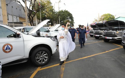 <p><strong>MODERNIZATION</strong>. A priest blesses several land mobility assets of the Philippine Coast Guard (PCG) at its headquarters in Port Area, Manila on Thursday (Jan. 12, 2023). Transportation Secretary Jaime Bautista vowed to continue the comprehensive modernization of the PCG through the acquisition of new assets and training for its officers.<em> (Photo courtesy of PCG)</em></p>