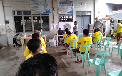 <p><strong>SPECIAL REGISTRATION.</strong> Persons deprived of liberty at the Bureau of Jail Management and Penology facility in Dumaguete City sign up for the May 2023 barangay and SK polls. The Commission on Elections in the city noted a low turnout in voters' registration in recent weeks. <em>(Photo courtesy of Comelec-Dumaguete)</em></p>