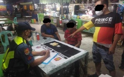 <p><strong>BUSTED.</strong> The 62-year-old suspect who posed as a mediaman during the operation by authorities in Calasiao town, Pangasinan on Jan. 11, 2023. The suspect asked for protection money from an establishment in exchange for alleged protection from police. <em>(Photo courtesy of Pangasinan PPO)</em></p>