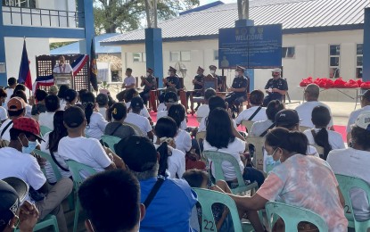 <p><strong>LIVELIHOOD SUPPORT.</strong> Ilocos Norte Gov. Matthew Joseph Manotoc welcomes former supporters of the New People's Army as they turn their back on anti-government activities. On Monday (Jan. 16, 2023), some 197 former members of communist groups and sectoral front organizations were handed PHP3,000 each along with family food packs at Camp Valentin S. Juan in Laoag City. <em>(PNA photo by Leilanie Adriano)</em></p>
