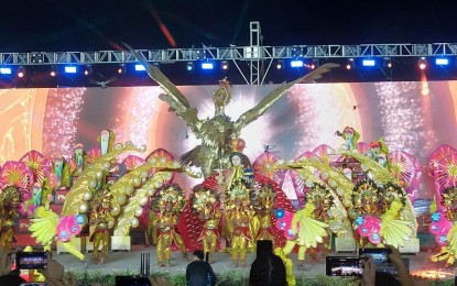 <p><strong>SINULOG WINNER.</strong> Dancers from the Omega de Salonera of Bucas Grande Island in Surigao del Norte province are shown performing their winning entry at the Sinulog 2023 Grand Festival at the South Road Properties in Cebu City on Sunday (Jan. 15, 2023). The organizers of the visiting contingent have as forefathers fiesta performers on Sanciangko Street, one of Cebu City's famous downtown roads, in the early 1900s. <em>(Photo courtesy of Cebu City PIO)</em></p>