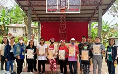 <p><strong>NEW LANDOWNERS.</strong> Farmers in southern Cebu receive their Certificate of Land Ownership Award (CLOA) from the Department of Agrarian Reform (DAR) in a recent distribution activity. DAR-Cebu agrarian reform program officer Grace Fua said Thursday (Jan. 26, 2023) a total of 400 farmers in Catmon town, north of Cebu province, received 326 CLOAs from the department.<em> (Photo courtesy of DAR)</em></p>