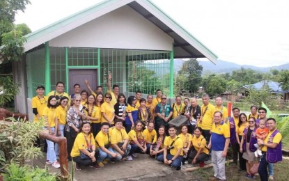 <p><strong>FOR THE LEARNERS</strong>. Officers and members of the Manila Action Lions Club District 301-A3 pose before their donated library at the Villafont Elementary School in Barangay Villafont in Sibalom town, Antique province on Jan. 14, 2023. School head Nynivo Esposo said on Tuesday (Jan. 17, 2023) the library will enrich the knowledge of the learners of the Ati community. <em>(Photo courtesy of Nynivo Esposo)</em></p>