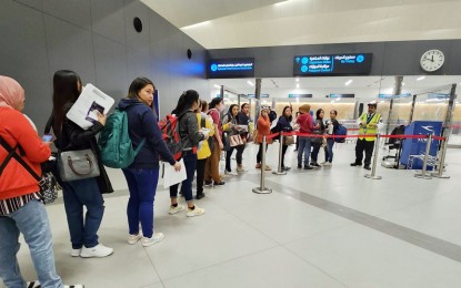 <p><strong>FREE.</strong> Distressed Filipino workers are leaving Kuwait in this photo taken on Tuesday (Jan. 17, 2023). The Department of Migrant Workers targets to bring home within two weeks at least 300 of the 461 staying in a Philippine-run shelter due to various issues, such as unpaid salaries or abusive employers. <em>(Courtesy of DMW)</em></p>