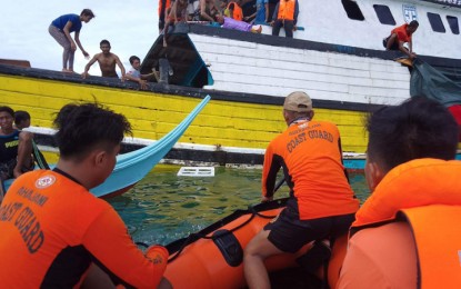 <p><strong>STUCK.</strong> A wooden-hulled vessel is stuck in shallow waters after running aground while on docking maneuver in Tanjung pier Monday (Jan. 16, 2023) in Barangay Kajatian, Indanan town, Sulu province. Personnel of the Philippine Coast Guard (PCG)-Western Sulu Station safely rescued the 11 crew members of the ill-fated vessel. <em>(Photo courtesy of PCG-WSS)</em></p>