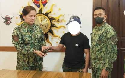 <p><strong>SURRENDER</strong>. A former squad leader of the New People's Army surrenders to authorities in Bulacan province on Tuesday (Jan. 17, 2023). He also turned over a .38-caliber revolver without a serial number and six pieces of ammunition. <em>(Photo courtesy of the Bulacan Police Provincial Office)</em></p>