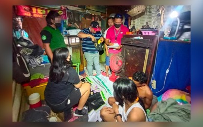 <p><strong><span data-preserver-spaces="true">DRUG DEN.</span></strong><span data-preserver-spaces="true"> Agents of the Philippine Drug Enforcement Agency are checking the evidence confiscated inside a drug den allegedly maintained by Maria Cristina Sacramento at Barangay Suba, Cebu City. PDEA-7 chief Levi Ortiz on Wednesday (Jan. 18, 2023) said six suspects were arrested while more than PHP1 million worth of suspected shabu were seized during simultaneous operations last Tuesday.  </span><em><span data-preserver-spaces="true">(Photo courtesy of PDEA-7)</span></em></p>
