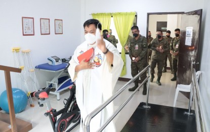 <p><strong>ENHANCED FACILITIES.</strong> Catholic priest Fr. Marvin Goles blessed the newly procured medical equipment and enhanced facilities of the Army’s 10th Infantry Division’s Camp General Manuel T. Yan Senior Station Hospital in Mawab, Davao De Oro, on Wednesday (Jan. 18, 2023).  The equipment upgrades are made possible by the 10ID’s Command Welfare Assistance Fund (CWAF) amounting to PHP1.6 million. <em>(Photo courtesy of 10ID)</em></p>