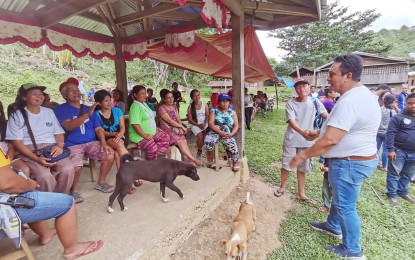 <p><strong>DIALOGUE.</strong> Negros Oriental Gov. Roel Degamo talks to constituents in Barangay Dobdob, Valencia and nearby areas during a visit to Tamlang Valley in this undated photo. The provincial government will build a 10-bed community primary hospital in the area to address the basic health care needs of mountain villagers. <em>(Photo by Judy Flores Partlow)</em></p>