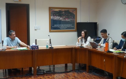 <p><strong>FEED MILL</strong>. Southeast Asian Fisheries Development Center - Aquaculture Department (SEAFDEC/AQD) chief Dan Baliao (left) meets with Bureau of Fisheries and Aquatic Resources 6 (Western Visayas) Director Remia Aparri (2nd from left) on Jan. 10, 2023 to discuss the development of commercial-scale aquaculture feed mills for cost-effective feeds. Baliao on Thursday (Jan. 19, 2023) said establishing a feed mill plant for cost-efficient feeds would invigorate the fisheries sector and help the country ensure food security. <em>(Photo courtesy of SEAFDEC/AQD)</em></p>