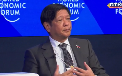 <p><strong>VIP CLUB.</strong> President Ferdinand R. Marcos Jr. attends a one-on-one dialogue with World Economic Forum (WEF) president Børge Brende in Davos, Switzerland on Jan. 19, 2023. Marcos has welcomed the Philippines’ inclusion in the "VIP Club” or a list of Southeast Asian countries with best-performing economies as tagged by economic leaders at the WEF. <em>(Screengrab from RTVM)</em></p>